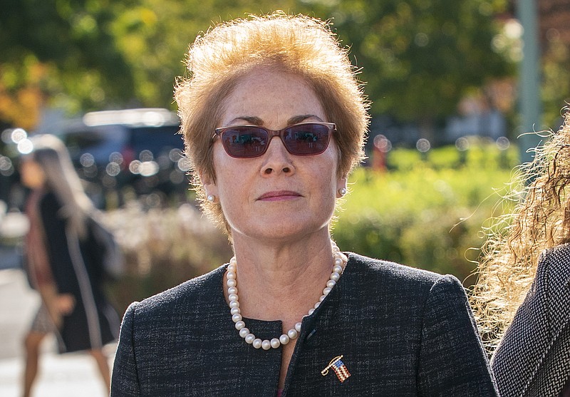 In this Oct. 11, 2019, file photo, former U.S. ambassador to Ukraine Marie Yovanovitch, arrives on Capitol Hill in Washington. The House impeachment panels are starting to release transcripts from their investigation. And in one of them, Yovanovitch says that Ukrainian officials warned her in advance that Rudy Giuliani and his allies were planning to "do things, including to me." (AP Photo/J. Scott Applewhite, File)