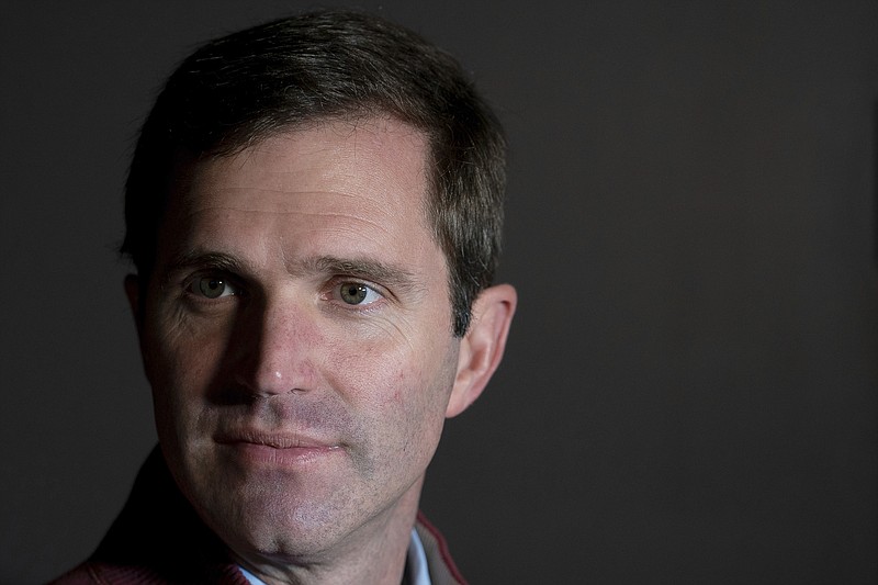 Kentucky Attorney General and Democratic Gubernatorial Candidate Andy Beshear poses for a photograph after voting, Tuesday, Nov. 5, 2019, in Louisville, Ky. (AP Photo/Bryan Woolston)