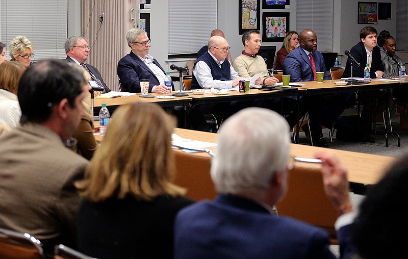 Hamilton County School Board and Hamilton County Commissioners wrap around a table at the Hamilton County Board of Education during a joint meeting Monday, January 14, 2019 in Chattanooga, Tennessee.