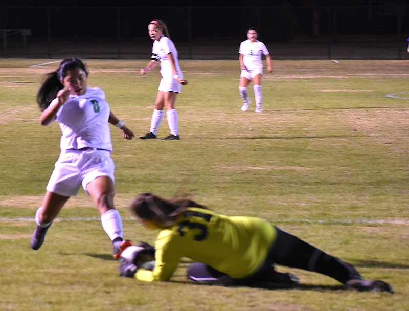 Staff photo by Patrick MacCoon / East Hamilton's Tenley Yates is blocked of a shot opportunity by Nolensville's goalie in a Class AA state quarterfinal Wednesday in Murfreesboro.