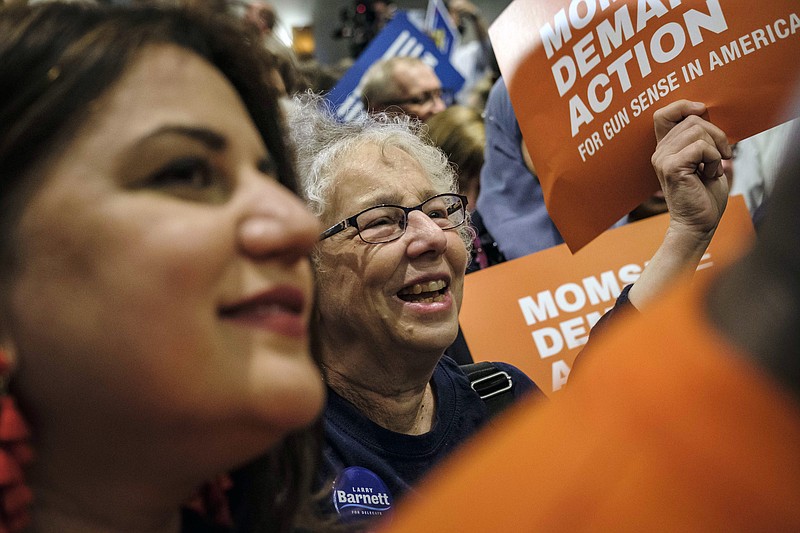 Carlos Bernate, The New York Times / Democrats celebrate winning control of the Virginia legislature at an election night gathering in Richmond on Tuesday night. Control of Virginia's government fell to Democrats for the first time in decades.