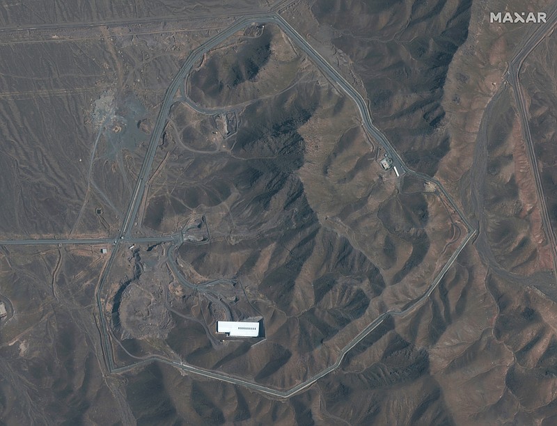 This Nov. 1, 2019, satellite image provided by provided by Maxar Technologies shows the Fordo nuclear facility, just north of the holy city of Qom in Iran. The resumption of activity at Fordo pushes the risk of a wider confrontation involving Iran even higher after months of attacks across the Middle East that the U.S. blames on Tehran. (Satellite image ©2019 Maxar Technologies via AP)