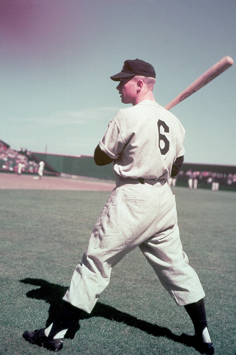 Mickey Mantle, infielder for the New York Yankees, warms up on April 1951. (AP File Photo)