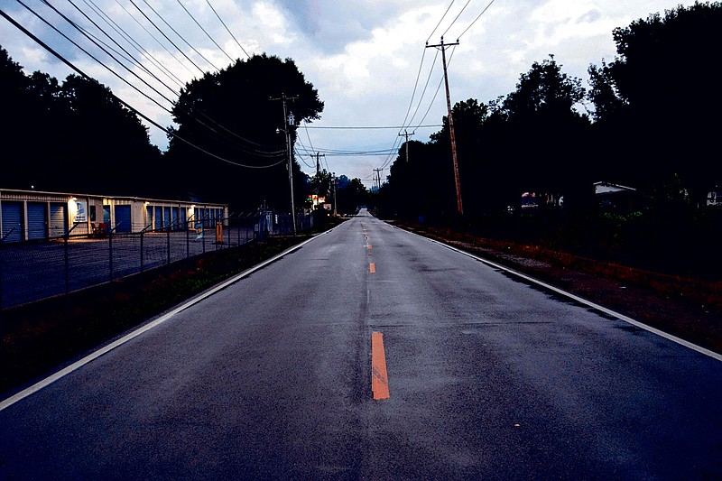 Staff file photo / Wilson Road is seen at dusk in this file photo from June 2019.