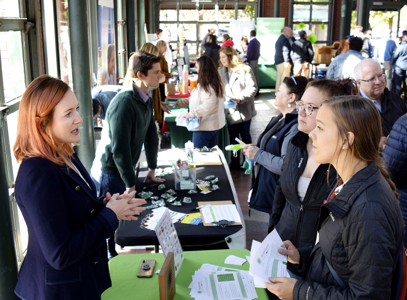 Staff Photo by Robin Rudd/ Kelley Cureton, left, Green Light Program Director for Greens Spaces talks with Randi Jones and Kelly Helton. During the EPB Green Expo, at Miller Plaza's Waterhouse Pavilion, it was announced that the EPB building will be one of the first LEED Gold buildings in Chattanooga. The Expo took place on November 8, 2019.