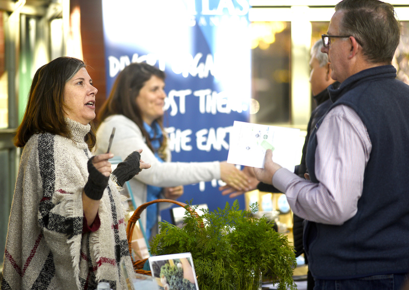Staff Photo by Robin Rudd/ Melonie Lusk, of Crabtree Farms, talks to Dan Gilmore about the farm's mission. During the EPB Green Expo, at Miller Plaza's Waterhouse Pavilion, it was announced that the EPB building will be one of the first LEED Gold buildings in Chattanooga. The Expo took place on November 8, 2019.
