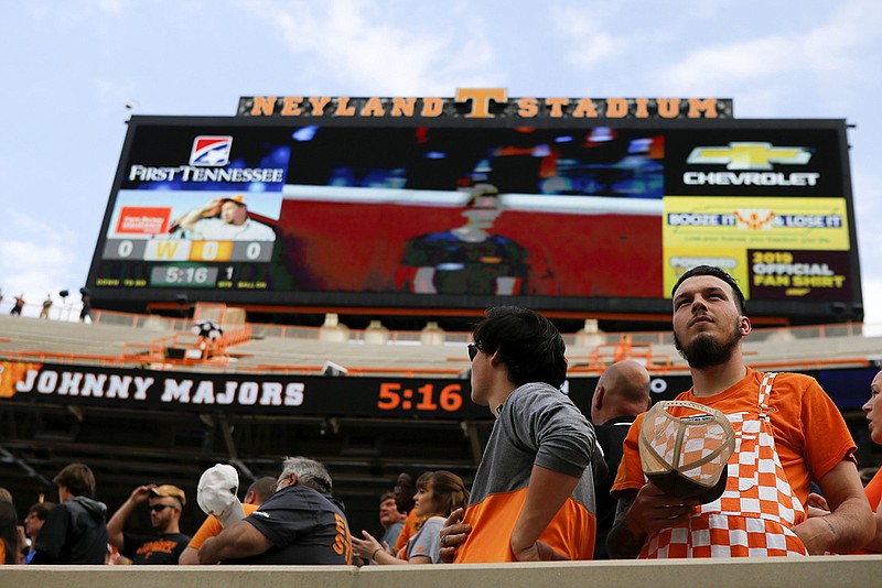 Staff photo by C.B. Schmelter / Tennessee fans stand during the national anthem before the Orange and White spring football game on April 13 Neyland Stadium.