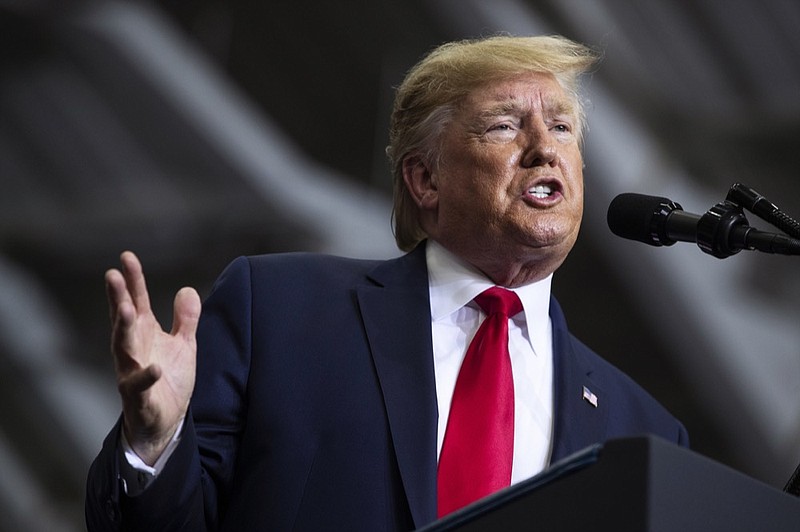 FILE - In this Nov. 6, 2019, file photo, President Donald Trump speaks during a campaign rally at the Monroe Civic Center in Monroe, La. (AP Photo/Evan Vucci, File)


