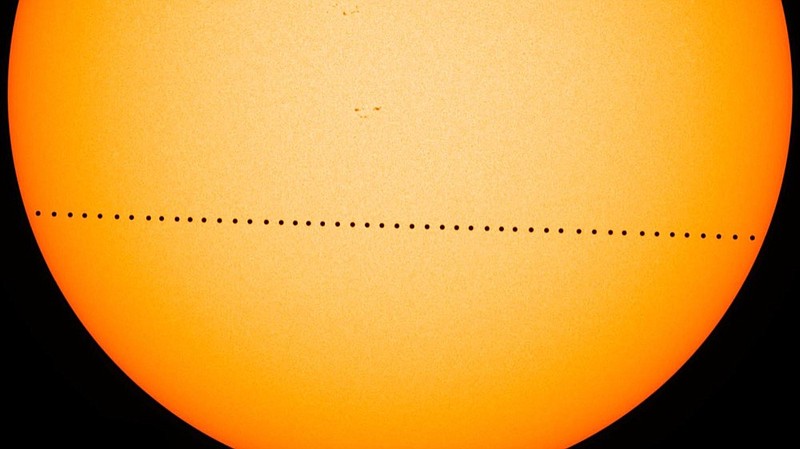 In this composite image provided by NASA, the planet Mercury passes directly between the sun and Earth on May 9, 2016 in a transit which lasted seven-and-a-half-hours. (NASA's Goddard Space Flight Center/SDO/Genna Duberstein via AP)


