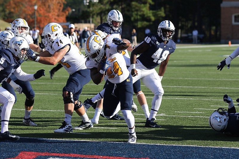 UTC photo by Eric Starling / UTC's Elijah Ibitokun-Hanks scores one of his two first-half touchdowns during Saturday's game at Samford.
