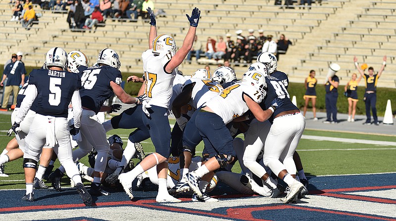 UTC photo by Ben Dodds / UTC celebrates a touchdown during the first half of Saturday's game at Samford. The Mocs won 35-27.