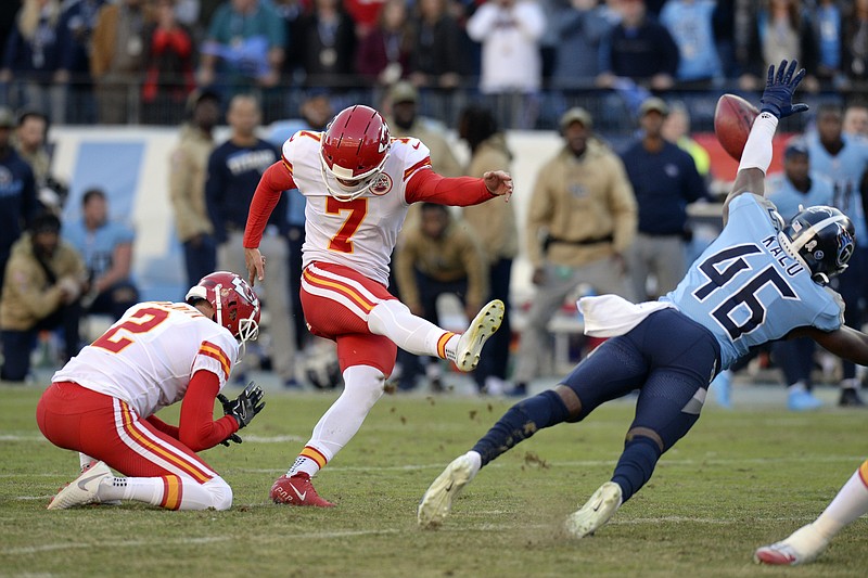 AP photo by Mark Zaleski / Tennessee Titans defensive back Joshua Kalu blocks a 52-yard field-goal attempt by Kansas City Chiefs kicker Harrison Butker on the final play of Sunday's game in Nashville.