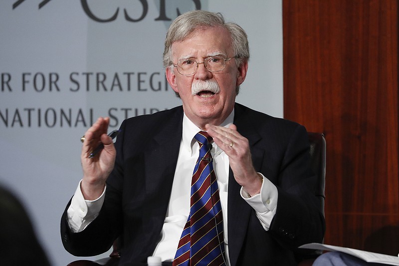 FILE - In this Sept. 30, 2019, file photo, former National security adviser John Bolton gestures while speakings at the Center for Strategic and International Studies in Washington. Bolton was "part of many relevant meetings and conversations" relevant to the House impeachment inquiry that are not yet public, his lawyer said Friday, Nov. 8. (AP Photo/Pablo Martinez Monsivais, File)