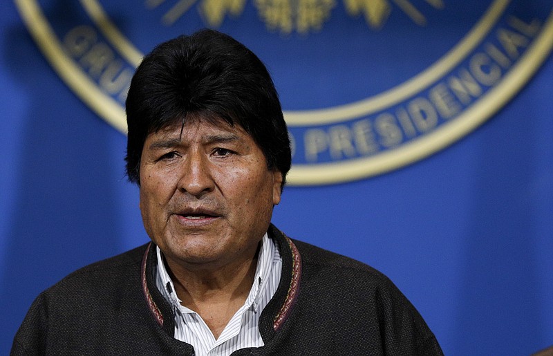 Bolivia's President Evo Morales looks on during a press conference in La Paz, Bolivia, Sunday, Nov. 10, 2019. Morales is calling for new presidential elections and an overhaul of the electoral system Sunday after a preliminary report by the Organization of American States found irregularities in the Oct. 20 elections. (AP Photo/Juan Karita)