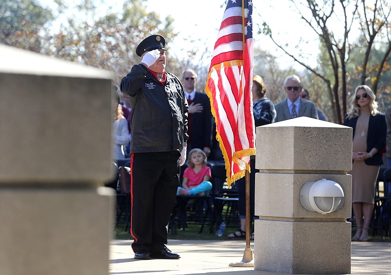 Staff photo by Erin O. Smith / Tom Sloan salutes the American flag after posting the colors during the Veterans Day Program Monday, November 11, 2018 at the Chattanooga National Cemetery in Chattanooga, Tennessee. Sloan was with the Vietnam Veterans of America Chapter 203.