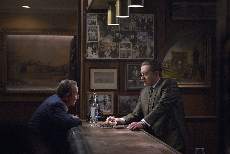 This image released by Netflix shows Joe Pesci, left, and Robert De Niro in a scene from "The Irishman." (Niko Tavernise/Netflix via AP)