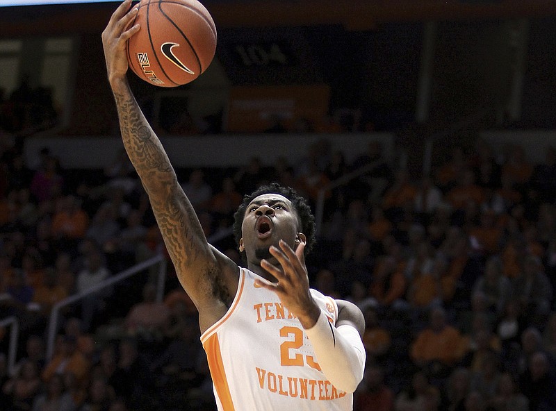 Tennessee's Jordan Bowden drives for a layup past UNC Asheville's LJ Thorpe during an NCAA college basketball game Tuesday, Nov. 5, 2019, in Knoxville, Tenn. (Tom Sherlin/The Daily Times via AP)