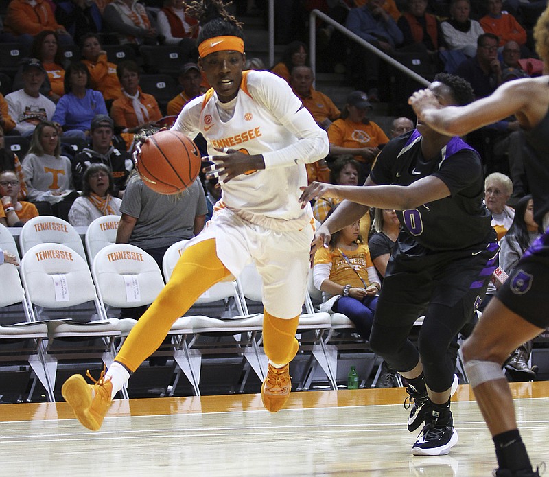 Tennessee's Rennia Davis drives past Central Arkansas's Ayanna Trigg during an NCAA college basketball game Thursday, Nov. 7, 2019, in Knoxville, Tenn. (Tom Sherlin/The Daily Times via AP)