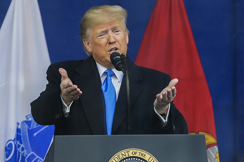 President Donald Trump speaks at New York City's 100th annual Veterans Day parade, Monday, Nov. 11, 2019, in New York. (AP Photo/Seth Wenig)