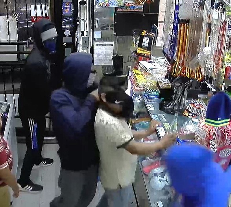 This photo shows suspects police say were involved in a Sept. 13, 2019, armed robbery at the La Esquinita store on Hamilton Street.  / Surveillance photo from video obtained by the Dalton Police Department