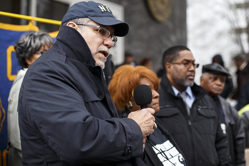 Staff photo by C.B. Schmelter / Robin Flores speaks to the media in front of the Hamilton County Justice Building before a march against police brutality and excessive force on Wednesday, Jan. 23, 2019, in Chattanooga, Tenn.