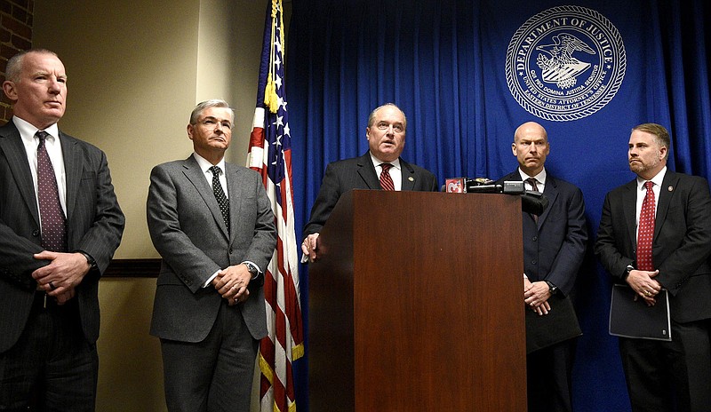 Staff Photo by Robin Rudd/ U.S. Attorney J. Douglas Overbey, center, flanked by other investigators, details the coordination necessary in the fraud case that spanned from Pikeville to Puerto Rico. The U.S. Attorney's office held a press conference to announce the guilty pleas of Rahim and Karim Sadruddin to three counts of wire fraud and money laundering on November 13, 2019.
