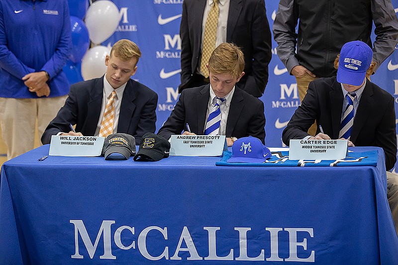 Photo by McCallie Athletics / From left, McCallie seniors Will Jackson, Andrew Prescott and Carter Edge sign NCAA Division I scholarships on Wednesday at the school. Jackson signed to swim for Tennessee, Prescott to play soccer for East Tennessee State and Edge to play baseball for Middle Tennessee State.