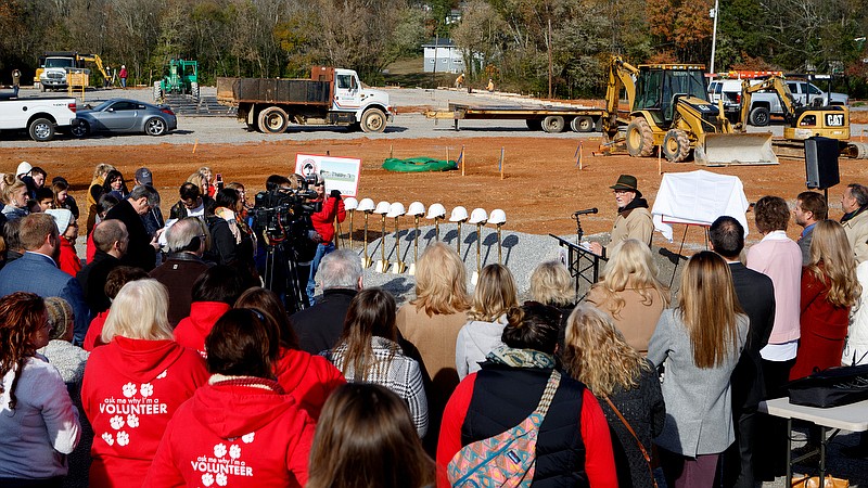 Staff photo by C.B. Schmelter / People gather around as Humane Educational Society Executive Director Phil Snyder, at podium, speaks during a ground breaking ceremony for the new HES facility on Thursday, Nov. 14, 2019 in Chattanooga, Tenn.