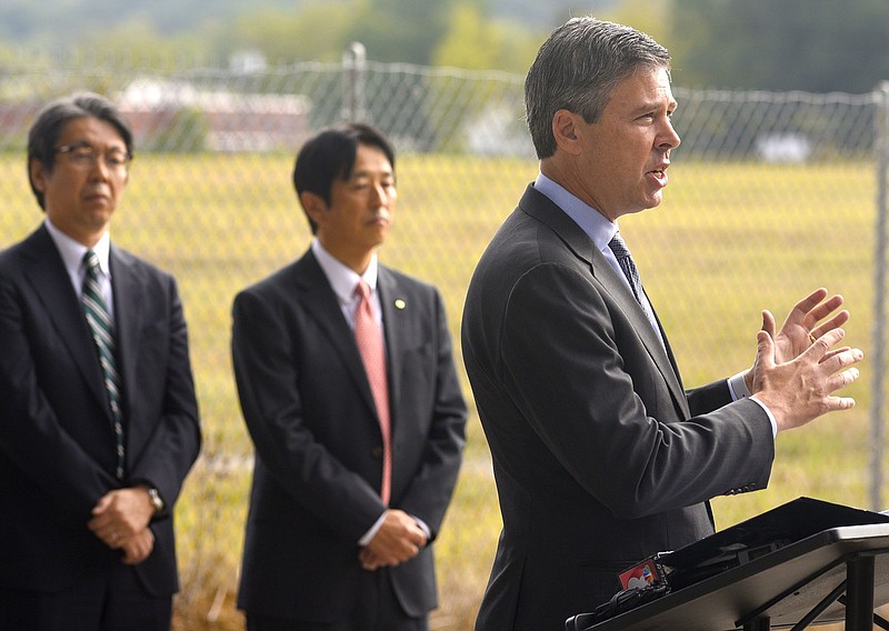 Staff file photo by Robin Rudd/ Chattanooga Mayor Andy Berke welcomes Nippon Paint USA, Inc. to Chattanooga in this file photo. Standing in front of the Harriet Tubman site and behind Burke from left are, Hiroyuki Kobayashi, consulate-general of Japan in Nashville and Tetsuro Fujita, president and CEO of Nippon Paint USA Inc.