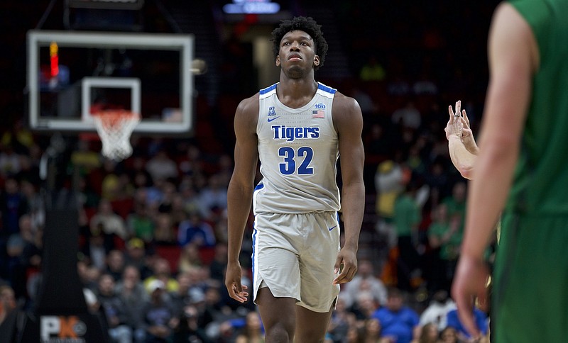 Memphis center James Wiseman walks off the court during the second half of the Tigers' game against Oregon on Nov. 12 in Portland. Oregon won 82-74. / AP photo by Craig Mitchelldyer