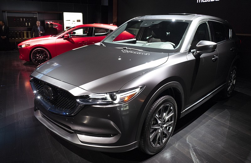 FILE - In this April 17, 2019 file photo, the 2019 Mazda CX-5 is shown at the New York Auto Show.  In its annual auto reliability survey, Consumer Reports found that while newly redesigned models have the latest safety and fuel-economy technology, they also come with glitches that frustrate owners. Overall, Japanese brands Lexus, Mazda and Toyota led the reliability rankings, followed by Porsche and Genesis. Rounding out the top 10 were Hyundai, Subaru, Dodge, Kia and Mini. (AP Photo/Mark Lennihan, File)