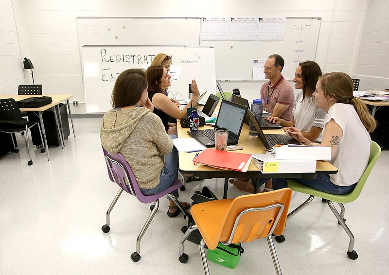 Learning designers, or teachers, plan for students to arrive later in the week at Howard Connect Academy Monday, August 5, 2019 in Chattanooga, Tennessee. School starts Wednesday for Howard Connect students. / Staff photo by Erin O. Smith