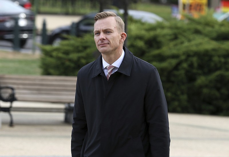 David Holmes, a career diplomat and the political counselor at the U.S. Embassy in Kyiv, Ukraine, arrives on Capitol Hill, Friday, Nov. 15, 2019, in Washington, to testify before congressional lawmakers as part of the House impeachment inquiry into President Donald Trump. (AP Photo/Jose Luis Magana)