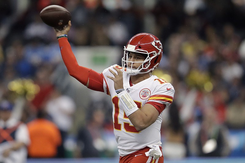 Kansas City Chiefs quarterback Patrick Mahomes throws a pass during the first half of an NFL football game against the Los Angeles Chargers, Monday, Nov. 18, 2019, in Mexico City. (AP Photo/Marcio Jose Sanchez)