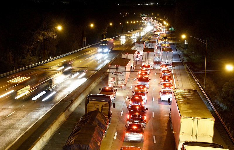 Staff Photo by Robin Rudd/   Eastbound traffic on Interstate 24 is at a near standstill, while traffic zips by in the westbound lanes, in this scene from the South Seminole Drive Bridge on November 16, 2019.  Thanksgiving holiday traffic is often affected by inconveniences such as weather and construction.  