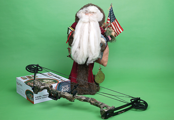 Staff photo by Erin O. Smith / Brand-new Cook's Secret microwave grill pan with silicone baking insert ($15), youth compound bow ($30), handmade, artist-signed Santa ($14.99).