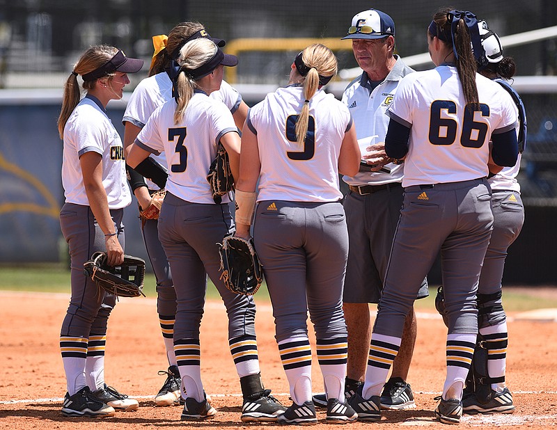 Staff photo / UTC softball coach Frank Reed talks to his players during a SoCon game against Furman in May 2017 at Jim Frost Stadium. The Mocs will face the U.S. women's national team at Frost next April as part of the Americans' national tour ahead of the Tokyo Olympics.