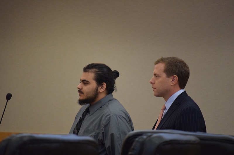 Staff photo by Ben Benton / Joseph Wielzen, left, and his attorney Andrew Brown, discuss Wielzen's decision to waive his right to testify on his own behalf on Wednesday, Nov. 20, 2019, in McMinn County Criminal Court in Athens. Tenn.
