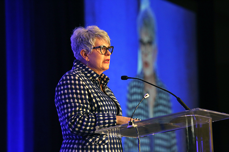 Staff photo by Erin O. Smith / Paula Henderson speaks during Women of Distinction.