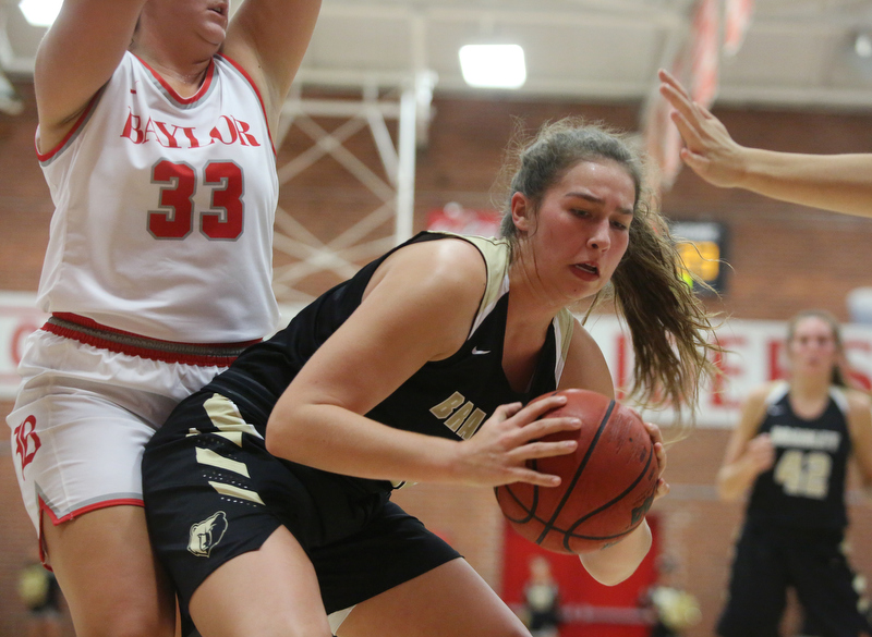 Staff photo by Erin O. Smith / Bradley Central's Anna Muhonen (43) is guarded by Baylor's Mary Ann McKnight (33) as she goes up for a shot during the Baylor vs. Bradley Central girls' basketball game Thursday, November 21, 2019 at Baylor School in Chattanooga, Tennessee.