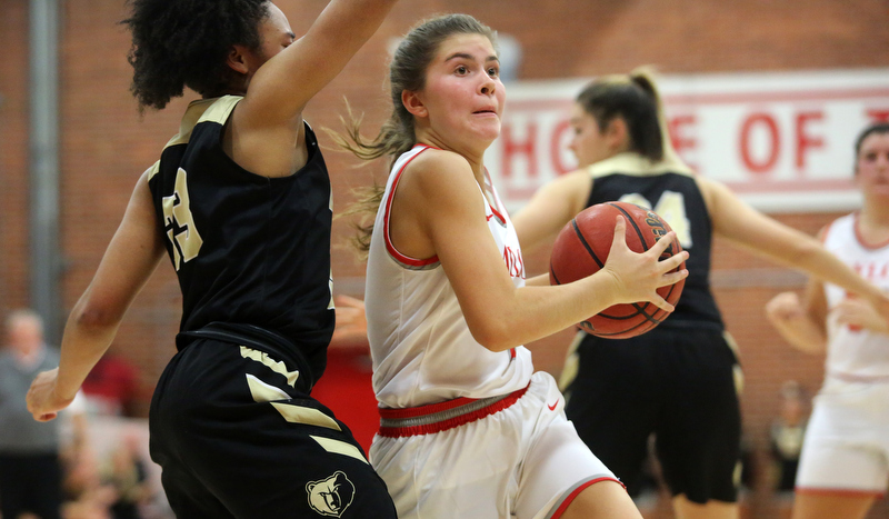 Staff photo by Erin O. Smith / Baylor's Bella White (4) goes up for a shot while being guarded by Bradley Central's Jamaryn Blair (33) during the Baylor vs. Bradley Central girls' basketball game Thursday, November 21, 2019 at Baylor School in Chattanooga, Tennessee.