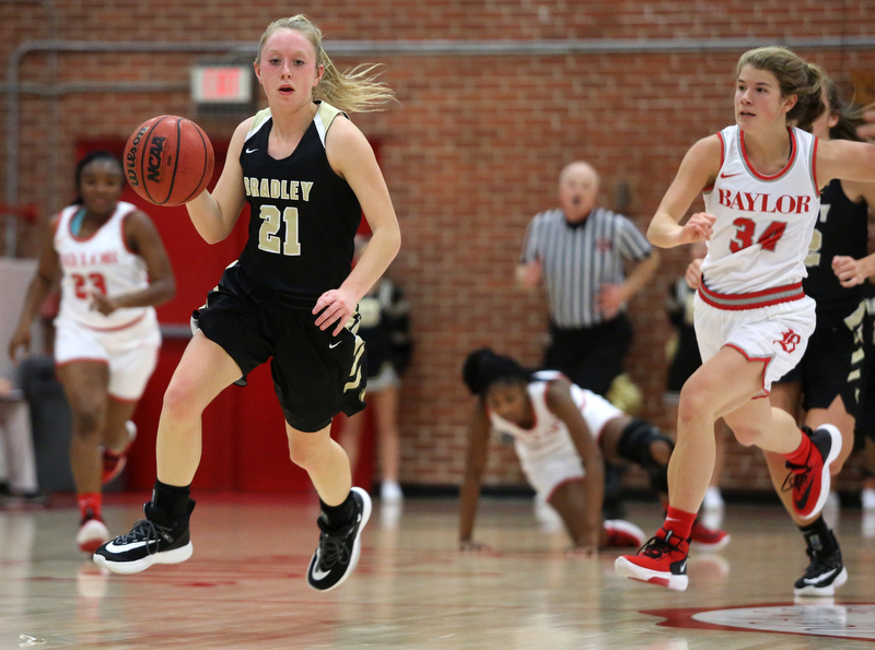 Staff photo by Erin O. Smith / Bradley Central's Cambree Mayo (21) dribble the ball downcourt during the Baylor vs. Bradley Central girls' basketball game Thursday, November 21, 2019 at Baylor School in Chattanooga, Tennessee.
