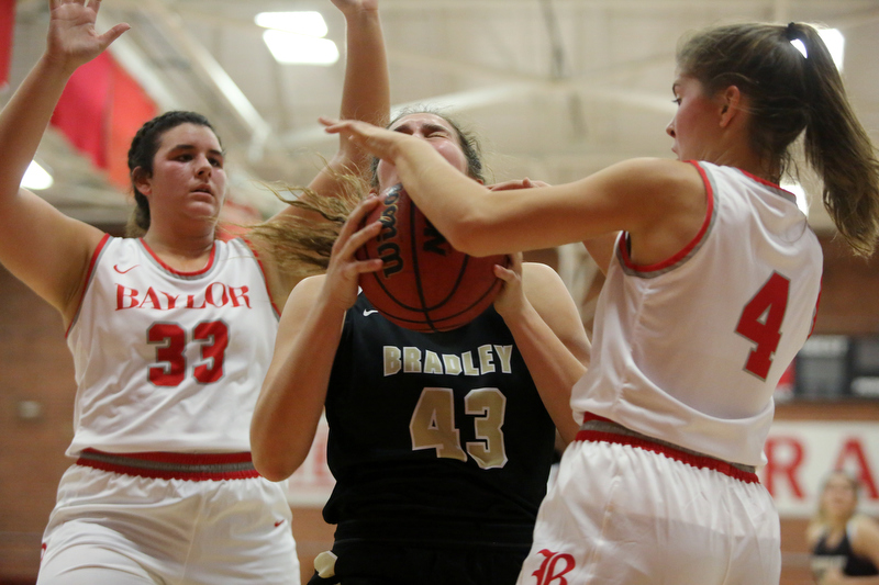 Staff photo by Erin O. Smith / Baylor's Macy Ann McKnight (33) puts pressure on Bradley Central's Anna Muhonen (43) as Muhonen is fouled by Baylor's Bella White (4) during the Baylor vs. Bradley Central girls' basketball game Thursday, November 21, 2019 at Baylor School in Chattanooga, Tennessee.