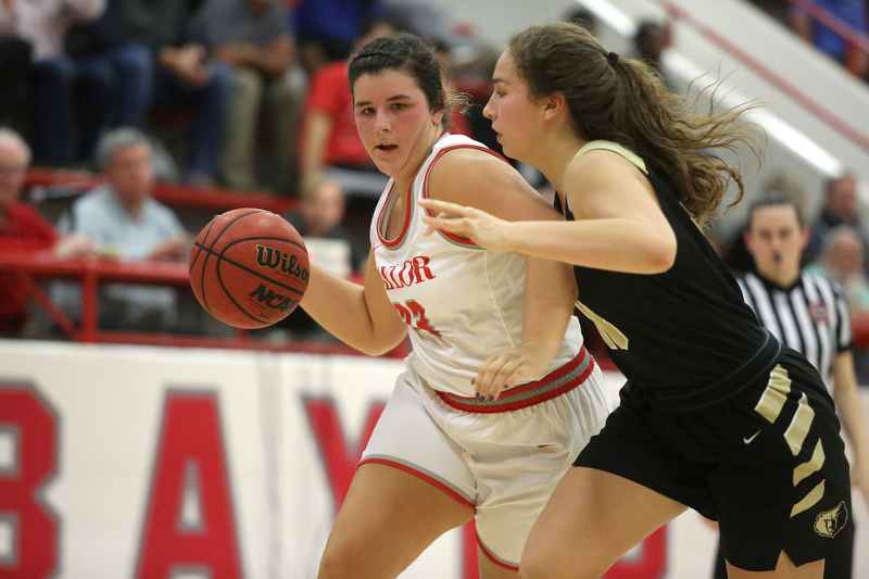 Staff photo by Erin O. Smith / Baylor's Macy Ann McKnight (33) dribbles the ball downcourt while being guarded by Bradley Central's Anna Muhonen (43) during the Baylor vs. Bradley Central girls' basketball game Thursday, November 21, 2019 at Baylor School in Chattanooga, Tennessee.