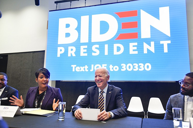 Former U.S. Vice President and 2020 Democratic presidential candidate Joe Biden reacts as he is introduced by Atlanta mayor Keisha Lance Bottoms during an assembly of Southern black mayors Thursday, Nov. 21, 2019 in Atlanta. (AP Photo/John Amis)