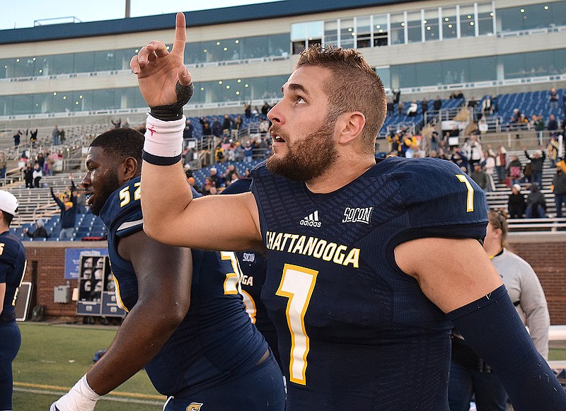 Staff photo by Robin Rudd / UTC senior Nick Tiano celebrates in the final second of his team's 34-33 comeback win over The Citadel last Saturday at Finley Stadium, a victory that kept alive the Mocs' hopes of sharing the SoCon title.
