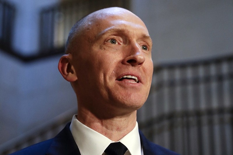 FILE - In this Nov. 2, 2017, photo, Carter Page, a foreign policy adviser to Donald Trump's 2016 presidential campaign, speaks with reporters following a day of questions from the House Intelligence Committee, on Capitol Hill in Washington. (AP Photo/J. Scott Applewhite)


