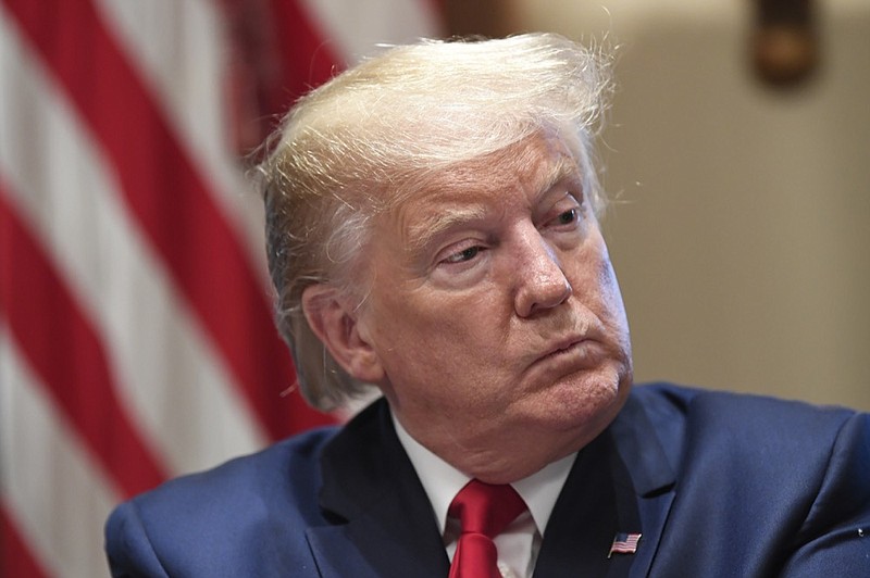 President Donald Trump listens during a meeting in the Cabinet Room of the White House in Washington, Friday, Nov. 22, 2019, on youth vaping and the electronic cigarette epidemic. (AP Photo/Susan Walsh)


