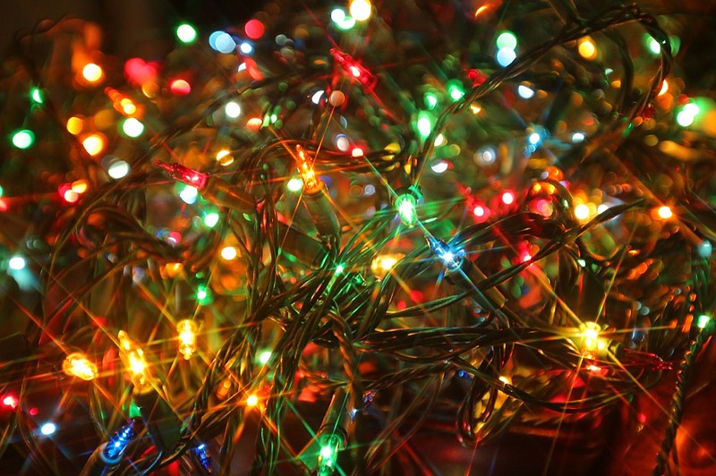 Colorful strand of Christmas lights closeup lights tile holiday light christmas tree / Getty Images
