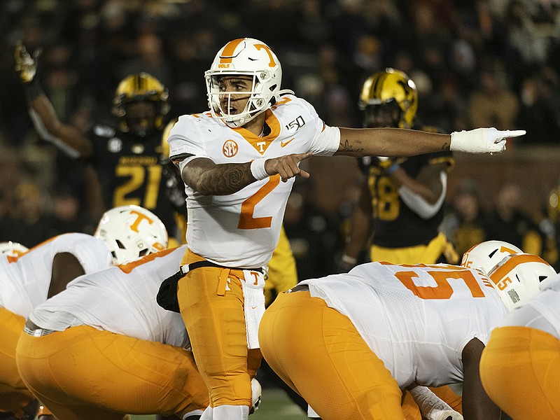 AP photo by L.G. Patterson / Tennessee quarterback Jarrett Guarantano calls a play during the third quarter Saturday night at Missouri.